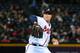 ATLANTA, GA - JULY 29: Scott Downs #32 of the Atlanta Braves pitches against the Colorado Rockies at Turner Field on July 29, 2013 in Atlanta, Georgia. (Photo by Scott Cunningham/Getty Images)
