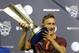 Jul 31, 2013; Kansas City, KS, USA; AS Roma forward Francesco Totti (10) holds up the MLS All Star Game trophy after the 2013 MLS All Star Game at Sporting Park. AS Roma won 3-1. Mandatory Credit: John David Mercer-USA TODAY Sports