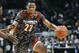 Apr 3, 2013; Chicago, IL, USA; McDonald's All American West forward Jabari Parker (22) dribbles the ball against McDonald's All American East forward Andrew Wiggins (22) during the second half at the United Center. McDonald's All American West defeats the East 110-99. Mandatory Credit: Mike DiNovo-USA TODAY Sports