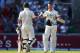 MANCHESTER, ENGLAND - AUGUST 01: Michael Clarke of Australia celebrates his century with Steve Smith during day one of the 3rd Investec Ashes Test match between England and Australia at Old Trafford Cricket Ground on August 1, 2013 in Manchester, England. (Photo by Michael Steele/Getty Images)