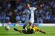 LEEDS, ENGLAND - AUGUST 03: Lee Peltier of Leeds in action with Liam Bridcutt of Brighton during the Sky Bet Championship match between Leeds United and Brighton & Hove Albion at Elland Road on August 03, 2013 in Leeds, England, (Photo by Michael Regan/Getty Images)