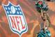 Dec 4, 2011; Miami, FL, USA; Miami Dolphins cheerleader poses by a NFL shield logo during the game against the Oakland Raiders at Sun Life Stadium. Mandatory Credit: Kirby Lee/Image of Sport-USA TODAY Sports