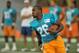 Jul 26, 2013; Davie, FL, USA; Miami Dolphins running back Lamar Miller (26) runs practice drills during training camp at the Doctors Hospital Training Facility at Nova Southeastern University. Mandatory Credit: Steve Mitchell-USA TODAY Sports