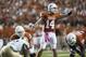 AUSTIN, TX - OCTOBER 20: David Ash #14 of the Texas Longhorns calls a play at the line of scrimmage during the Big 12 Conference game against the Baylor University Bears on October 20, 2012 at Darrell K Royal-Texas Memorial Stadium in Austin, Texas. (Photo by Cooper Neill/Getty Images)