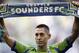 Clint Dempsey celebrates his new club