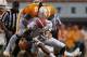 KNOXVILLE, TN - SEPTEMBER 15: Quinton Dunbar #1 of the Florida Gators tackled by A.J. Johnson #45 and Eric Gordon #24 of the Tennessee Volunteers during the second half of play at Neyland Stadium on September 15, 2012 in Knoxville, Tennessee. (Photo by John Sommers II/Getty Images)
