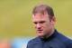 BURTON-UPON-TRENT, ENGLAND - MAY 27: Wayne Rooney of England looks on during a training session at St Georges Park on May 27, 2013 in Burton-upon-Trent, England. (Photo by Alex Livesey/Getty Images)