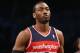 NEW YORK, NY - APRIL 15: John Wall #2 of the Washington Wizards takes the foul shot against the Brooklyn Nets at the Barclays Center on April 15, 2013 in New York City. The Nets defeated the Washington Wizards 106-101. NOTE TO USER: User expressly acknowledges and agrees that, by downloading and/or using this photograph, user is consenting to the terms and conditions of the Getty Images License Agreement. (Photo by Bruce Bennett/Getty Images)