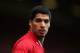 LIVERPOOL, ENGLAND - AUGUST 03: Luis Suarez of Liverpool in action during the Steven Gerrard Testimonial Match between Liverpool and Olympiacos at Anfield on August 03, 2013 in Liverpool, England. (Photo by Clive Brunskill/Getty Images)