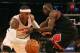 Jan 11, 2013; New York, NY, USA; New York Knicks small forward Carmelo Anthony (7) drives past Chicago Bulls small forward Luol Deng (9) during the third quarter at Madison Square Garden. Chicago won 108-101. Mandatory Credit: Anthony Gruppuso-USA TODAY Sports