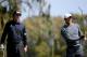 SAN FRANCISCO, CA - JUNE 14: Tiger Woods of the United States watches a shot on the second hole as Phil Mickelson looks on during the first round of the 112th U.S. Open at The Olympic Club on June 14, 2012 in San Francisco, California. (Photo by Harry How/Getty Images)