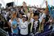 SO KON PO, HONG KONG - JULY 27: Fans cheer for their team during the Third Place Play-Off match between Tottenham and South China at Hong Kong Stadium on July 27, 2013 in So Kon Po, Hong Kong. (Photo by Chris McGrath/Getty Images for FA Premier League)