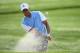 ROCHESTER, NY - AUGUST 06: Tiger Woods of the United States plays a bunker shot during a practice round prior to the start of the 95th PGA Championship at Oak Hill Country Club on August 6, 2013 in Rochester, New York. (Photo by Stuart Franklin/Getty Images)
