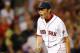 BOSTON, MA - JULY 23: Koji Uehara #19 of the Boston Red Sox reacts against the Tampa Bay Rays after a scoreless 9th inning at Fenway Park on July 23, 2013 in Boston, Massachusetts. (Photo by Jim Rogash/Getty Images)