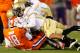 ATLANTA, GA - OCTOBER 29: Jaron Brown #18 of the Clemson Tigers is tackled by Jeremiah Attaochu #45, Isaiah Johnson #1 and Logan Walls #96 of the Georgia Tech Yellow Jackets at Bobby Dodd Stadium on October 29, 2011 in Atlanta, Georgia. (Photo by Kevin C. Cox/Getty Images)