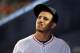 Jul 10, 2013; Miami, FL, USA; Miami Marlins starting pitcher Jose Fernandez (16) reacts from the dugout during the seventh inning against the Atlanta Braves at Marlins Park. Mandatory Credit: Steve Mitchell-USA TODAY Sports