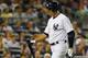 NEW YORK, NY - AUGUST 09: Alex Rodriguez #13 of the New York Yankees walksback to the dugout after striking out with a man on third in the third inning against the Detroit Tigers at Yankee Stadium on August 9, 2013 in the Bronx borough of New York City. (Photo by Mike Stobe/Getty Images)