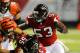Aug 8, 2013; Atlanta, GA, USA; Atlanta Falcons linebacker Brian Banks (53) makes a play against the Cincinnati Bengals during the second half at the Georgia Dome. The Bengals defeated the Falcons 34-10. Mandatory Credit: Dale Zanine-USA TODAY Sports