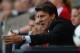 SWANSEA, WALES - AUGUST 01: Swansea manager Michael Laudrup looks on during the UEFA Europa League third round qualifying first leg match between Swansea City and Malmo at the Liberty Stadium on August 1, 2013 in Swansea, Wales. (Photo by Michael Regan/Getty Images)