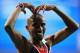 MOSCOW, RUSSIA - AUGUST 16: Mo Farah of Great Britain celebrates winning gold in the Men's 5000 metres final during Day Seven of the 14th IAAF World Athletics Championships Moscow 2013 at Luzhniki Stadium at Luzhniki Stadium on August 16, 2013 in Moscow, Russia. (Photo by Julian Finney/Getty Images)