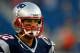 FOXBORO, MA - AUGUST 16: Tom Brady #12 of the New England Patriots warms up prior to the game against the Tampa Bay Buccaneers at Gillette Stadium on August 16, 2013 in Foxboro, Massachusetts. (Photo by Jared Wickerham/Getty Images)