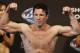 Aug 16, 2013; Boston, MA, USA; Chael Sonnen flexes during the weigh-in for his UFC fight at TD Garden. Mandatory Credit: Winslow Townson-USA TODAY Sports