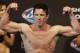 Aug 16, 2013; Boston, MA, USA; Chael Sonnen flexes during the weigh-in for his UFC fight at TD Garden. Mandatory Credit: Winslow Townson-USA TODAY Sports