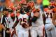 Aug 17, 2013; Cincinnati, OH, USA; Cincinnati Bengals running back Giovani Bernard (25) celebrates with center Kyle Cook (64) after scoring a touchdown in the first quarter of a preseason game against the Tennessee Titans at Paul Brown Stadium. Mandatory Credit: Andrew Weber-USA TODAY Sports