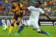 KUALA LUMPUR, MALAYSIA - JULY 21: Michael Essien of Chelsea tackles Norsharul of Malaysia during the match between Chelsea and Malaysia XI on July 21, 2013 at the Shah Alam Stadium in Shah Alam, Kuala Lumpur, Malaysia. (Photo by Stanley Chou/Getty Images)