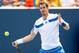 CINCINNATI, OH - AUGUST 15: Andy Murray of Grerat Britain returns a shot to Julien Benneteau of France during the Western & Southern Open on August 15, 2013 at Lindner Family Tennis Center in Cincinnati, Ohio. (Photo by Matthew Stockman/Getty Images)