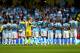 MANCHESTER, ENGLAND - AUGUST 19: The players of Manchester City stand for a one minutes applause in memory of former player Bert Trautmann prior to the Barclays Premier League match between Manchester City and Newcastle United at the Etihad Stadium on August 19, 2013 in Manchester, England. (Photo by Alex Livesey/Getty Images)