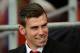 CARDIFF, WALES - AUGUST 14: Welsh international Gareth Bale, missing the game due to injury, sits on the subs bench during the International Friendly match between Wales v Ireland at the Cardiff City Stadium on August 14, 2013 in Cardiff, Wales. (Photo by Matthew Horwood/Getty Images)