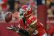 Aug 16, 2013; Kansas City, MO, USA; Kansas City Chiefs defensive back Quintin Demps (35) receives a kickoff which he will runback for a touchdown in the first quarter of the game against the San Francisco 49ers at Arrowhead Stadium. Mandatory Credit: Denny Medley-USA TODAY Sports