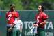 Jul 27, 2013; Cortland, NY, USA; New York Jets quarterback Geno Smith (7) jokes with quarterback Mark Sanchez (6) following training camp at SUNY Cortland. Mandatory Credit: Rich Barnes-USA TODAY Sports