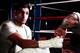BOLTON, ENGLAND - APRIL 22: Amir Khan has his hands wrapped during a photo shoot at Gloves Gym on April 22, 2013 in Bolton, England. (Photo by Scott Heavey/Getty Images)