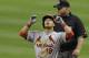 Kolten Wong doubles in a game against the Brewers on Aug. 20.