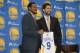 July 11, 2013; Oakland, CA, USA; Andre Iguodala (left) poses for a photo with Golden State Warriors general manager Bob Myers (right) in a press conference after a sign-and-trade deal for Iguodala to become a Golden State Warriors player at the Warriors Practice Facility. Mandatory Credit: Kyle Terada-USA TODAY Sports