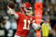 Aug 9, 2013; New Orleans, LA, USA; Kansas City Chiefs quarterback Alex Smith (11) makes a throw against the New Orleans Saints in the first quarter. Mandatory Credit: Chuck Cook-USA TODAY Sports