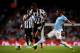 MANCHESTER, ENGLAND - AUGUST 19: Sammy Ameobi of Newcastle United is tackled by Fernandinho of Manchester City during the Barclays Premier League match between Manchester City and Newcastle United at the Etihad Stadium on August 19, 2013 in Manchester, England. (Photo by Michael Regan/Getty Images)
