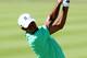 JERSEY CITY, NJ - AUGUST 24: Tiger Woods of the United States hits his second shot on the 13th hole during the third round of The Barclays at Liberty National Golf Club on August 24, 2013 in Jersey City, New Jersey. (Photo by Jeff Gross/Getty Images)