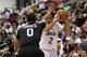 Jul 15, 2013; Las Vegas, NV, USA; Los Angeles Lakers forward Elias Harris (2) controls the ball against Los Angeles Clippers center Brandon Davies (0) during an NBA Summer League game at Cox Pavillion. Mandatory Credit: Stephen R. Sylvanie-USA TODAY Sports