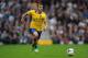 LONDON, ENGLAND - AUGUST 24: Jack Wilshere of Arsenal with the ball during the Barclays Premier League match between Fulham and Arsenal at Craven Cottage on August 24, 2013 in London, England. (Photo by Jamie McDonald/Getty Images)