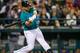 SEATTLE, WA - AUGUST 26: Kendrys Morales #8 of the Seattle Mariners hits into a groundout in the sixth inning against the Texas Rangers at Safeco Field on August 26, 2013 in Seattle, Washington. (Photo by Otto Greule Jr/Getty Images)