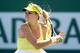 INDIAN WELLS, CA - MARCH 10: Maria Kirilenko of Russia returns a shot to Mallory Burdette during the BNP Paribas Open at the Indian Wells Tennis Garden on March 10, 2013 in Indian Wells, California. (Photo by Matthew Stockman/Getty Images)