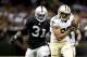 Aug 16, 2013; New Orleans, LA, USA; New Orleans Saints wide receiver Nick Toon (88) catches a pass over Oakland Raiders cornerback Tracy Porter (31) during the first quarter of a preseason game at the Mercedes-Benz Superdome. Mandatory Credit: Derick E. Hingle-USA TODAY Sports