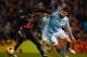 MANCHESTER, UNITED KINGDOM - DECEMBER 03: Sakho Mamadou of Paris Saint Germain battles for the ball with Ched Evans of Manchester City during the UEFA Cup Group A match between Manchester City and Paris Saint-Germain at The City of Manchester Stadium on December 3, 2008 in Manchester, England. (Photo by Clive Mason/Getty Images)