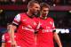 LONDON, ENGLAND - AUGUST 27: Lukas Podolski (L) of Arsenal is injured during the UEFA Champions League Play Off Second leg match between Arsenal FC and Fenerbahce SK at Emirates Stadium on August 27, 2013 in London, England. (Photo by Michael Regan/Getty Images)