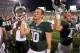 EAST LANSING, MI - AUGUST 31: Andrew Maxwell #10 of the Michigan State Spartans celebrates a 17-13 victory over the Boise State Broncos with teammates and fans at Spartan Stadium on August, 2010 in East Lansing, Michigan. (Photo by Gregory Shamus/Getty Images)