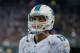 HOUSTON, TX - AUGUST 17: Ryan Tannehill #17 of the Miami Dolphins warms up during a timeout against the Houston Texans during a preseaon game at Reliant Stadium on August 17, 2013 in Houston, Texas. (Photo by Scott Halleran/Getty Images)