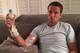 Lawrence Tynes' PICC can be seen in his right arm as he holds a plastic bulb filled with antibiotics. Courtesy: Amanda Tynes' Twitter (@AmandaTynes9).